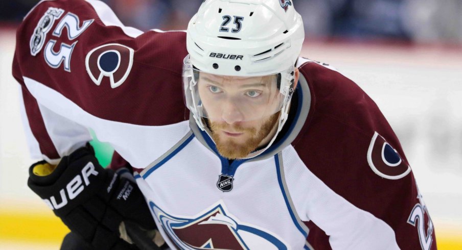 Mar 4, 2017; Winnipeg, Manitoba, CAN; Colorado Avalanche center Mikhail Grigorenko (25) lines up at the face off circle during the first period against the Winnipeg Jets at the MTS Centre.