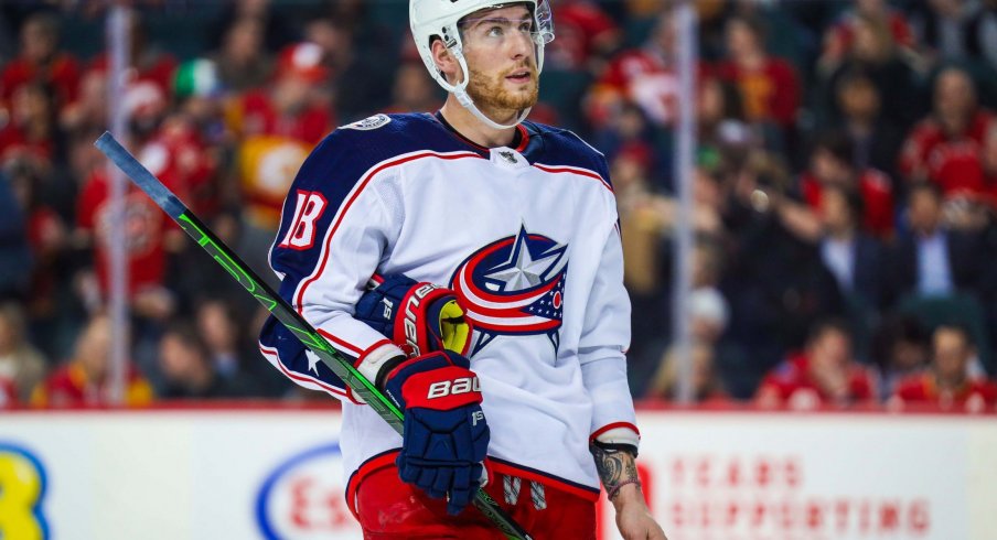 Mar 4, 2020; Calgary, Alberta, CAN; Columbus Blue Jackets center Pierre-Luc Dubois (18) against the Calgary Flames during the second period at Scotiabank Saddledome.