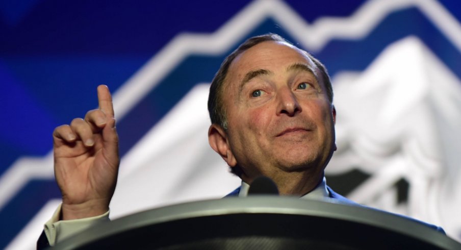 NHL commissioner Gary Bettman asks for the crowd to quiet down during the 2019 NHL Draft