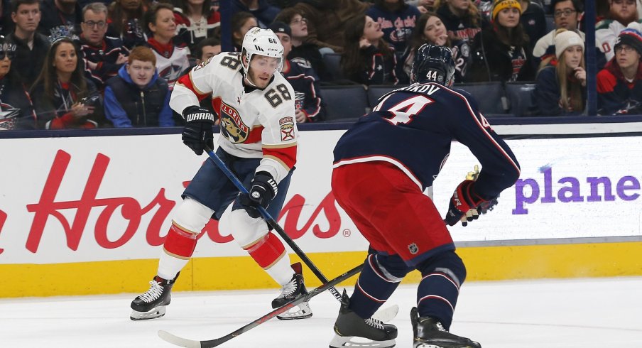  Florida Panthers left wing Mike Hoffman (68) controls the puck against Columbus Blue Jackets defenseman Vladislav Gavrikov (44) during the first period at Nationwide Arena.