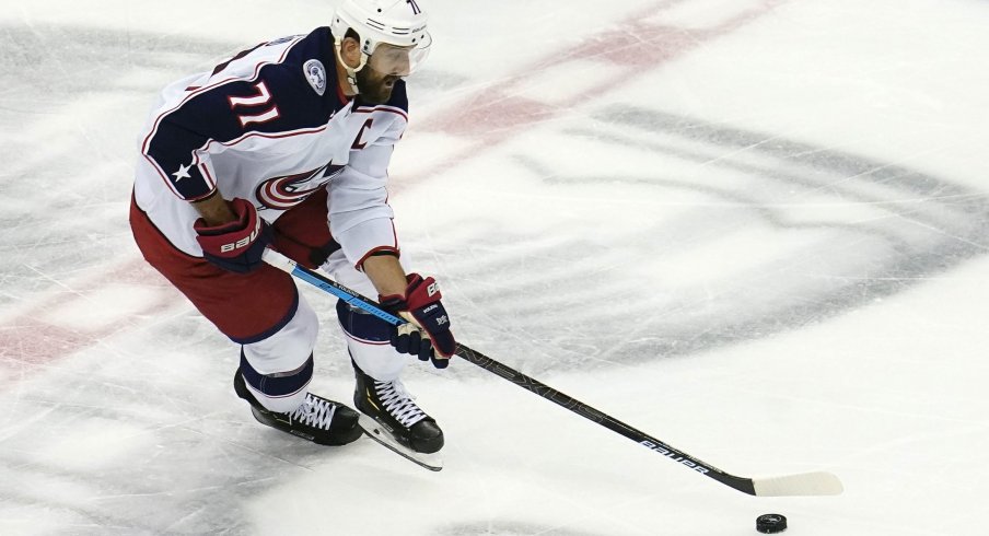 Aug 19, 2020; Toronto, Ontario, CAN; Columbus Blue Jackets left wing Nick Foligno (71) moves the puck against the Tampa Bay Lightning during the first period in game five of the first round of the 2020 Stanley Cup Playoffs at Scotiabank Arena.