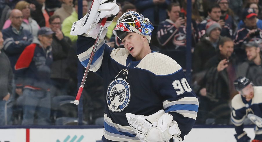 Columbus Blue Jackets goalie Elvis Merzlikins (90) during third period time out against the Winnipeg Jets at Nationwide Arena. 