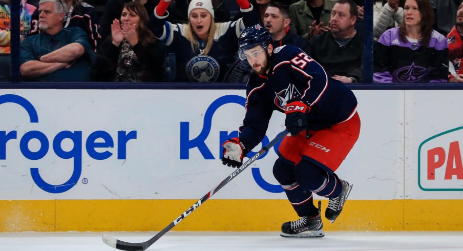 Feb 24, 2020; Columbus, Ohio, USA; Columbus Blue Jackets center Emil Bemstrom (52) skates with the puck against the Ottawa Senators in the overtime period at Nationwide Arena.