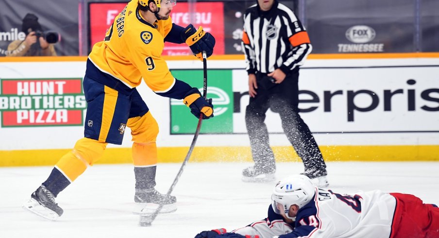 Filip Forsberg scores past a block attempt from Michael Del Zotto at Bridgestone Arena