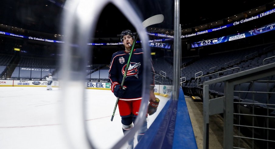 Jan 21, 2021; Columbus, Ohio, USA; Columbus Blue Jackets center Pierre-Luc Dubois (18) skates along the boards during a stop in play against the Tampa Bay Lightning in the first period at Nationwide Arena.