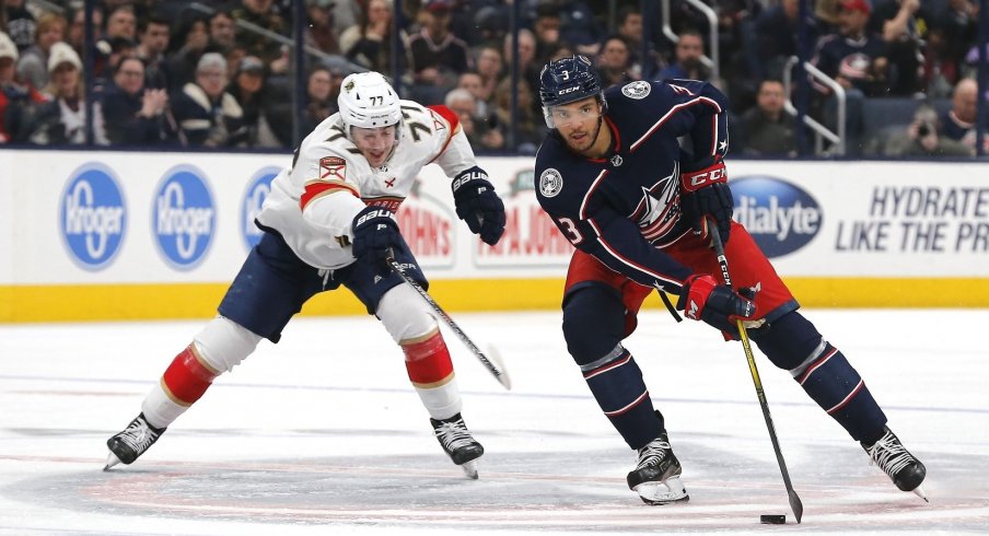 Columbus Blue Jackets defenseman Seth Jones controls the puck against Florida's Frank Vatrano.