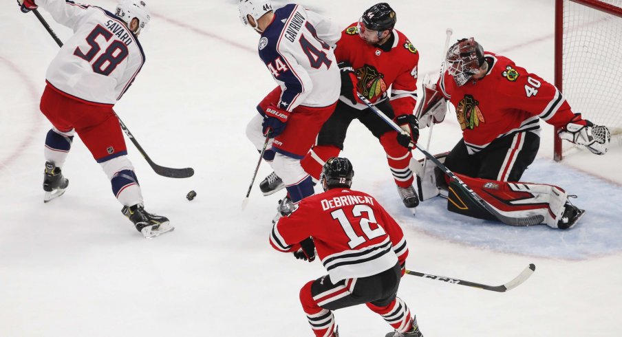 Oct 18, 2019; Chicago, IL, USA; Columbus Blue Jackets defenseman David Savard (58) looks to score against the Chicago Blackhawks during the first period at United Center.