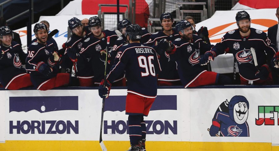 Feb 8, 2021; Columbus, Ohio, USA; Columbus Blue Jackets center Jack Roslovic (96) celebrates a goal against the Carolina Hurricanes during the third period at Nationwide Arena.