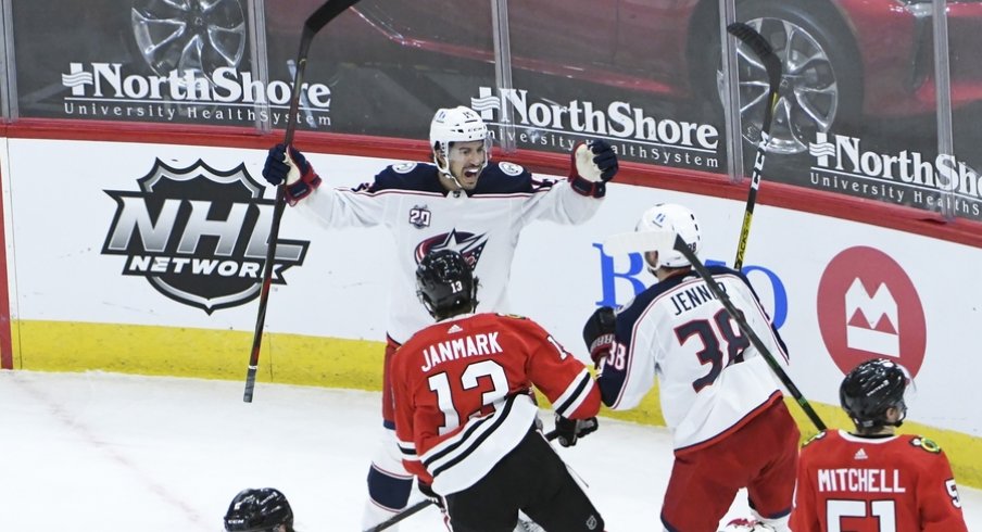 Columbus Blue Jackets defenseman Michael Del Zotto (15) celebrates his goal against the Chicago Blackhawks during the third period at United Center. 