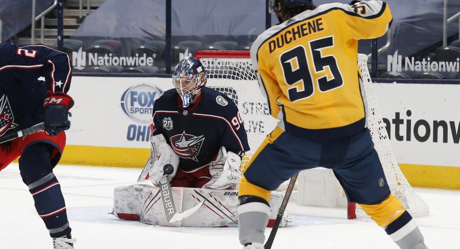 Columbus Blue Jackets goalie Elvis Merzlikins makes a stick save during the second period against the Nashville Predators at Nationwide Arena. 