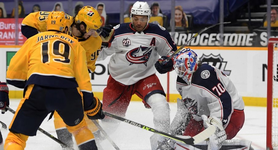 Columbus Blue Jackets goaltender Joonas Korpisalo (70) blocks a shot by Nashville Predators center Matt Duchene (95) during the third period at Bridgestone Arena.