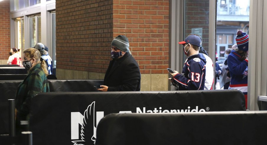 Mar 2, 2021; Columbus, Ohio, USA; Fans file into Nationwide Arena, for the first time this season, for the game between the Columbus Blue Jackets and Detroit Red Wings.