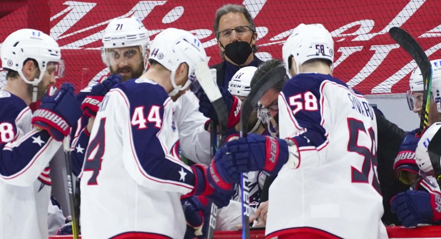 Mar 20, 2021; Raleigh, North Carolina, USA; Columbus Blue Jackets head coach John Tortorella looks on during a timeout against the Carolina Hurricanes at PNC Arena.