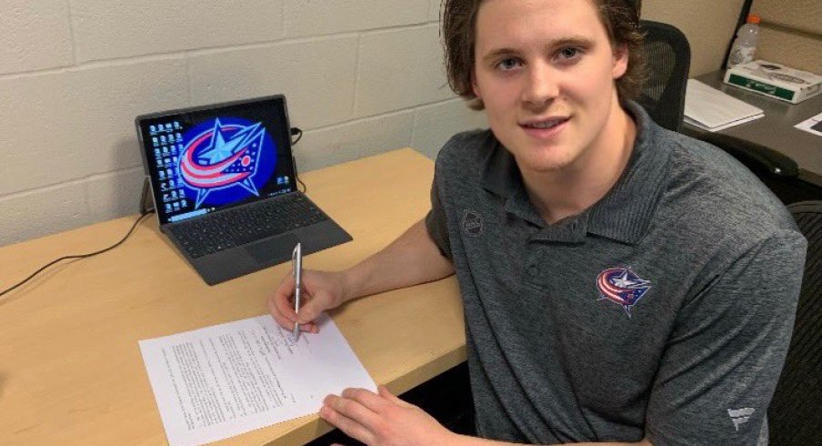 Tyler Angle signs his ELC with the Blue Jackets.