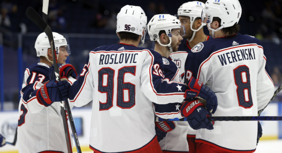 Columbus Blue Jackets right wing Oliver Bjorkstrand (28) is congratulated by teammates after scoring a goal against the Tampa Bay Lightning during the second period at Amalie Arena.