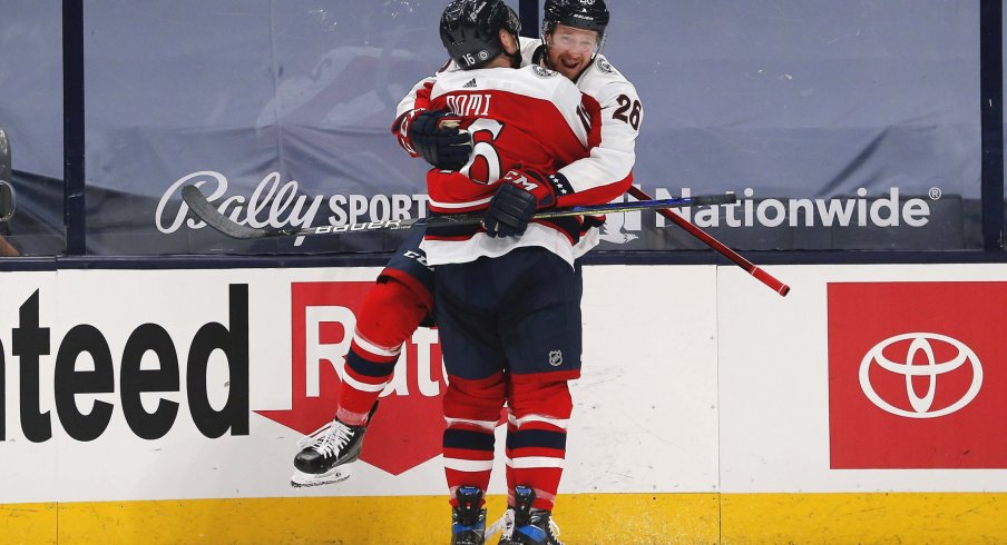 Apr 6, 2021; Columbus, Ohio, USA; Columbus Blue Jackets center Zac Dalpe (26) celebrates a goal against the Tampa Bay Lightning during the first period at Nationwide Arena.