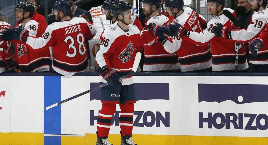 Jack Roslovic celebrates a goal against the Tampa Bay Lightning