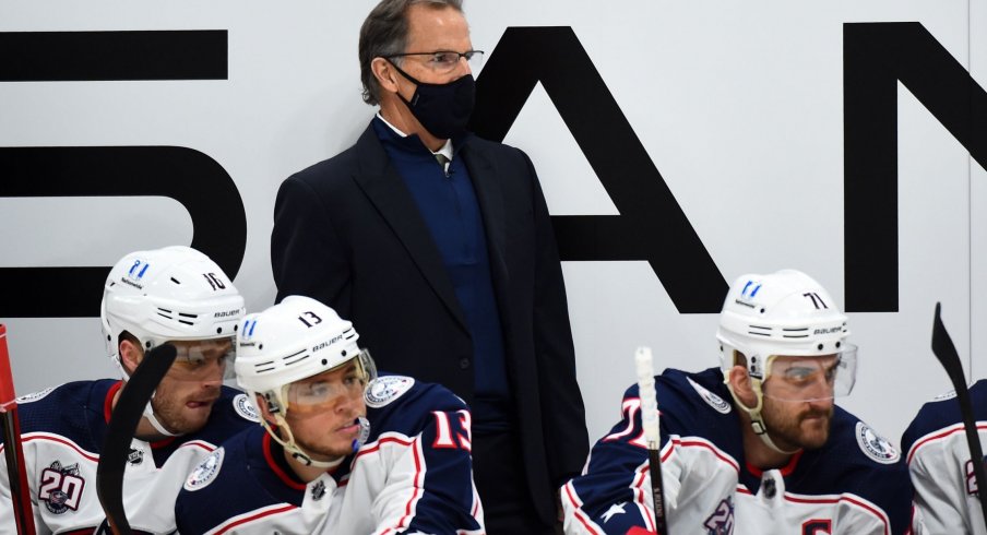 Jan 14, 2021; Nashville, Tennessee, USA; Columbus Blue Jackets head coach John Tortorella looks on from the bench during the first period against the Nashville Predators at Bridgestone Arena.