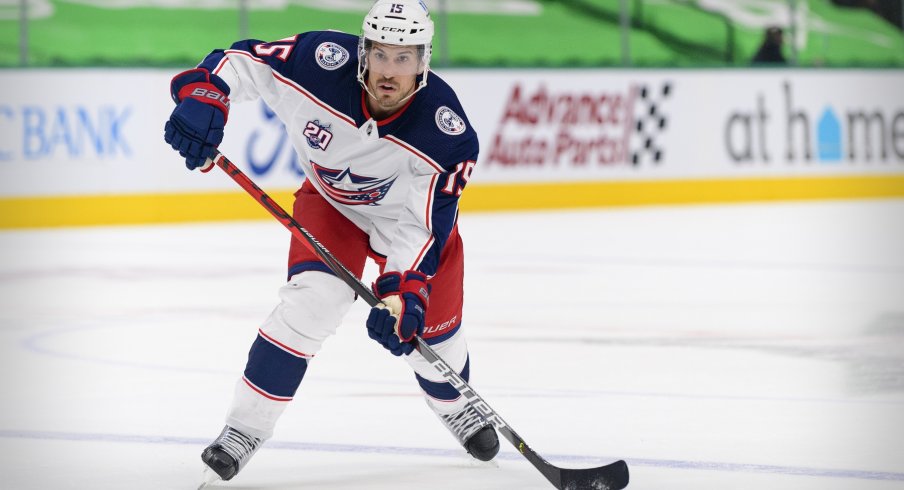 Columbus Blue Jackets defenseman Michael Del Zotto (15) passes the puck during the first period against the Dallas Stars at the American Airlines Center. 