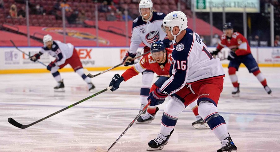 Apr 4, 2021; Sunrise, Florida, USA; Columbus Blue Jackets center Max Domi (16) controls the puck against the Florida Panthers during the first period at BB&T Center.