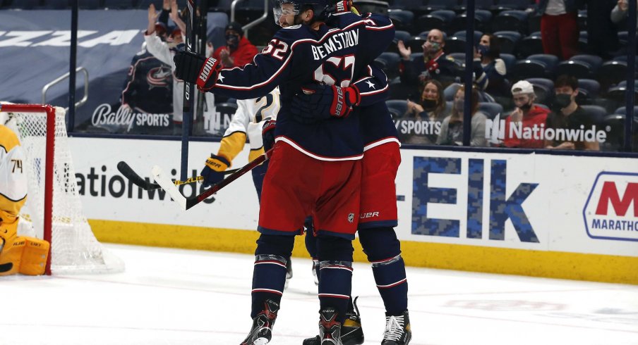 May 3, 2021; Columbus, Ohio, USA; Columbus Blue Jackets center Emil Bemstrom (52) celebrates a goal against the Nashville Predators during the third period at Nationwide Arena.