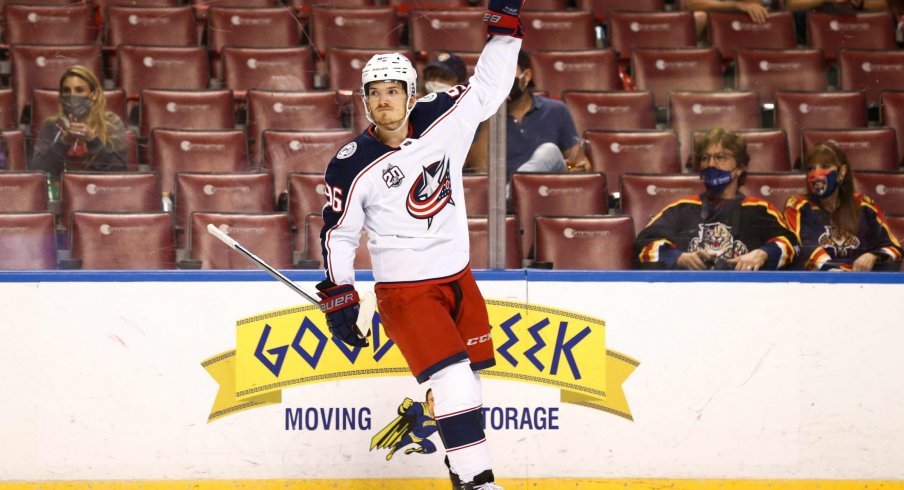 Apr 20, 2021; Sunrise, Florida, USA; Columbus Blue Jackets center Jack Roslovic (96) celebrates after scoring against the Florida Panthers during the first period at BB&T Center.