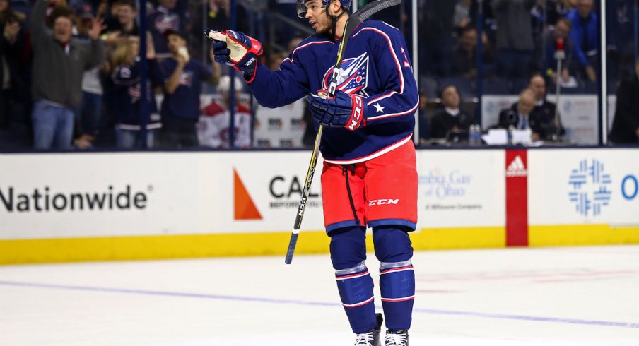 Columbus Blue Jackets defenseman Seth Jones (3) is congratulated by right wing Patrik Laine (29) after his first period goal against the Carolina Hurricanes at PNC Arena.