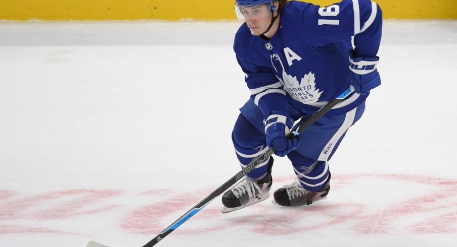 Apr 29, 2021; Toronto, Ontario, CAN; Toronto Maple Leafs forward Mitch Marner (16) skates with the puck against Vancouver Canucks in the third period at Scotiabank Arena.