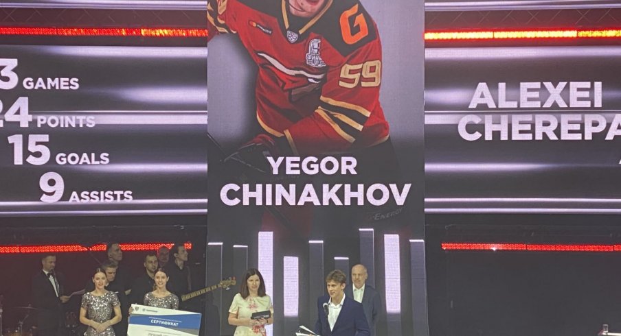 Yegor Chinakhov accepts his award.