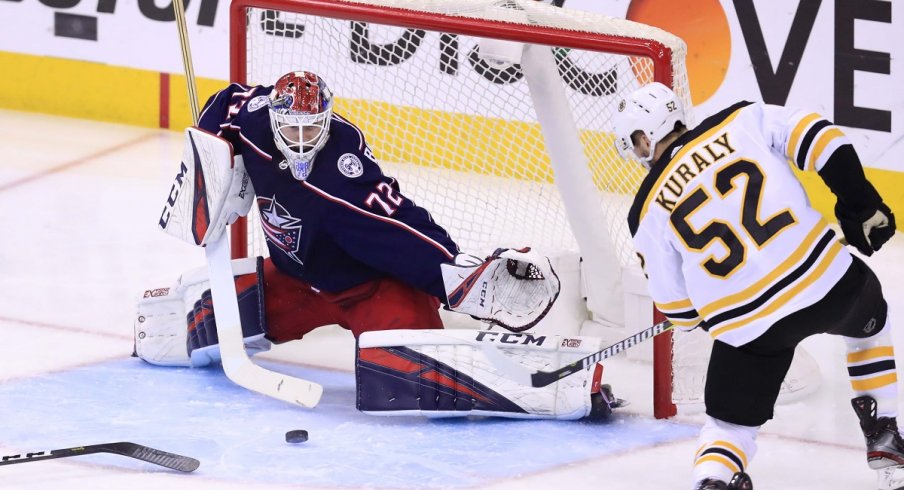 Sergei Bobrovsky makes a save against Boston Bruins center Sean Kuraly during game six of the second round of the 2019 Stanley Cup Playoffs