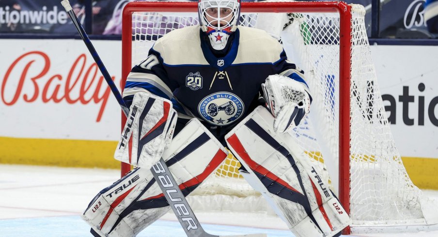 May 7, 2021; Columbus, Ohio, USA; Columbus Blue Jackets goaltender Matiss Kivlenieks (80) defends the net against the Detroit Red Wings in the second period at Nationwide Arena.