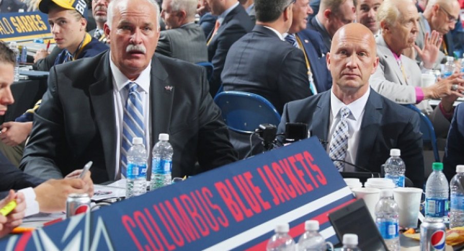 Jarmo Kekalainen and John Davidson at the NHL draft.