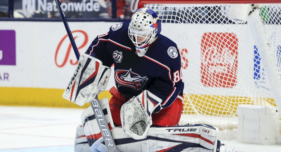 May 8, 2021; Columbus, Ohio, USA; Columbus Blue Jackets goaltender Matiss Kivlenieks (80) makes a save in net against the Detroit Red Wings in the second period at Nationwide Arena.