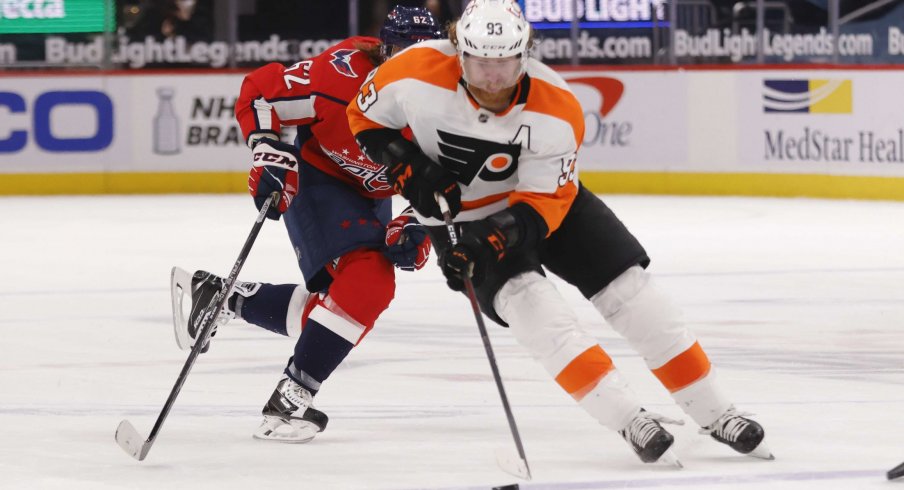 May 8, 2021; Washington, District of Columbia, USA; Philadelphia Flyers right wing Jakub Voracek (93) skates with the puck as Washington Capitals left wing Carl Hagelin (62) chases in the third period at Capital One Arena.