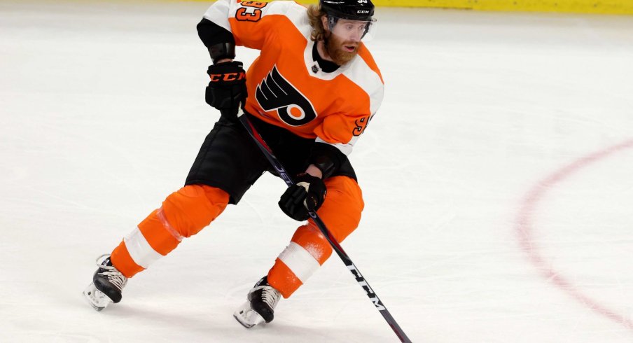 Feb 28, 2021; Buffalo, New York, USA; Philadelphia Flyers right wing Jakub Voracek (93) skates with the puck against the Buffalo Sabres during the second period at KeyBank Center.