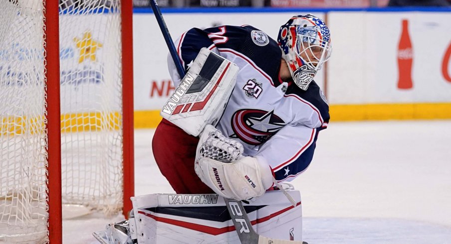 Apr 4, 2021; Sunrise, Florida, USA; Columbus Blue Jackets goaltender Joonas Korpisalo (70) blocks the puck against the Florida Panthers during the second period at BB&T Center.