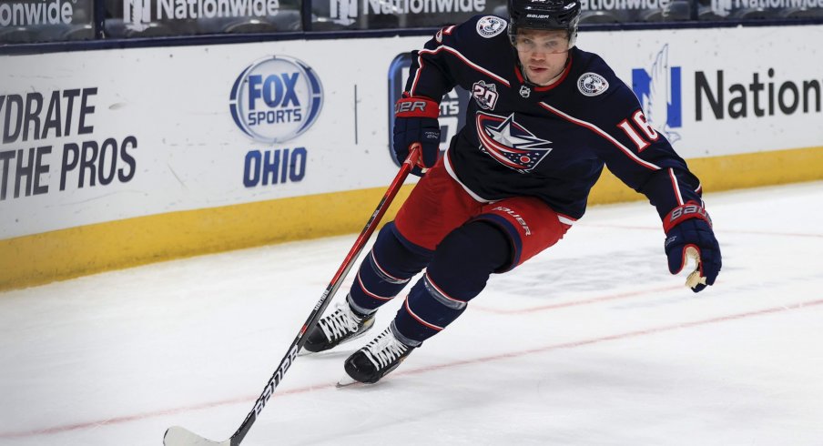 Jan 28, 2021; Columbus, Ohio, USA; Columbus Blue Jackets center Max Domi (16) controls the puck against the Florida Panthers in the overtime period at Nationwide Arena.
