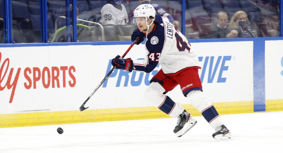 Apr 25, 2021; Tampa, Florida, USA; Columbus Blue Jackets defenseman Mikko Lehtonen (43) skates with the puck against the Tampa Bay Lightning during the second period at Amalie Arena.