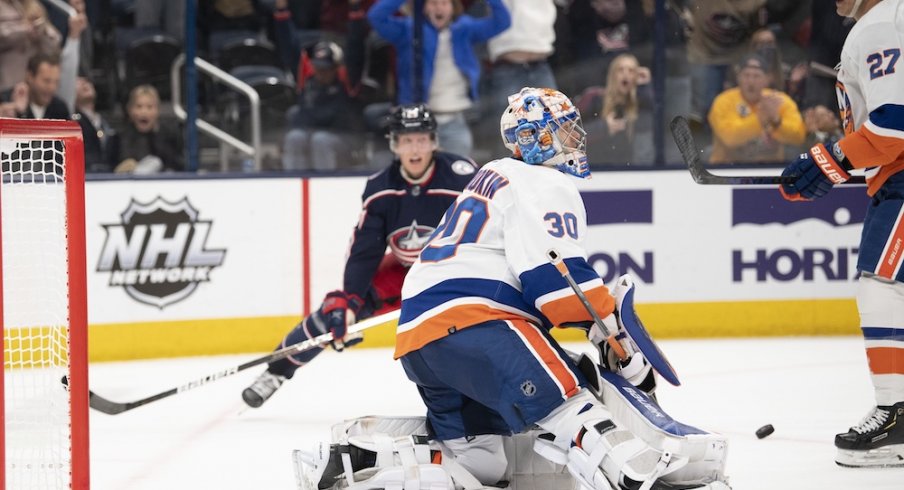 Patrik Laine scores a goal for the Columbus Blue Jackets against the New York Islanders at Nationwide Arena.