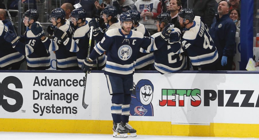Oct 23, 2021; Columbus, Ohio, USA; Columbus Blue Jackets center Boone Jenner (38) celebrates a goal against the Carolina Hurricanes during the second period at Nationwide Arena.