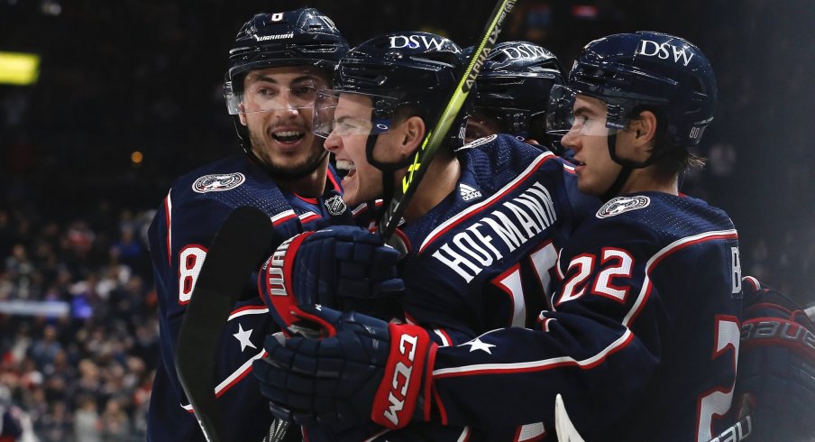 Oct 25, 2021; Columbus, Ohio, USA; Columbus Blue Jackets centerGregory Hofmann (15) celebrates a goal against the Dallas Stars during the second period at Nationwide Arena.