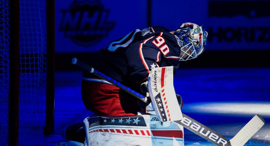 Oct 21, 2021; Columbus, Ohio, USA; Columbus Blue Jackets goaltender Elvis Merzlikins (90) stretches before playing against the New York Islanders at Nationwide Arena.