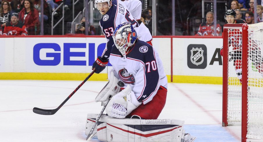 Columbus Blue Jackets goaltender Joonas Korpisalo (70) makes a save against the New Jersey Devils during the second period at Prudential Center.