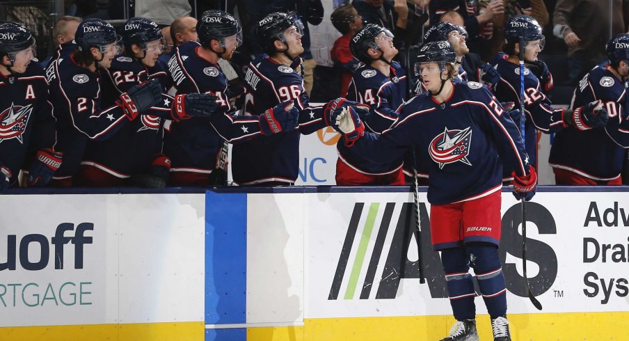 Dec 5, 2021; Columbus, Ohio, USA; Columbus Blue Jackets defenseman Adam Boqvist (27) celebrates a goal against the San Jose Sharks during the first period at Nationwide Arena.