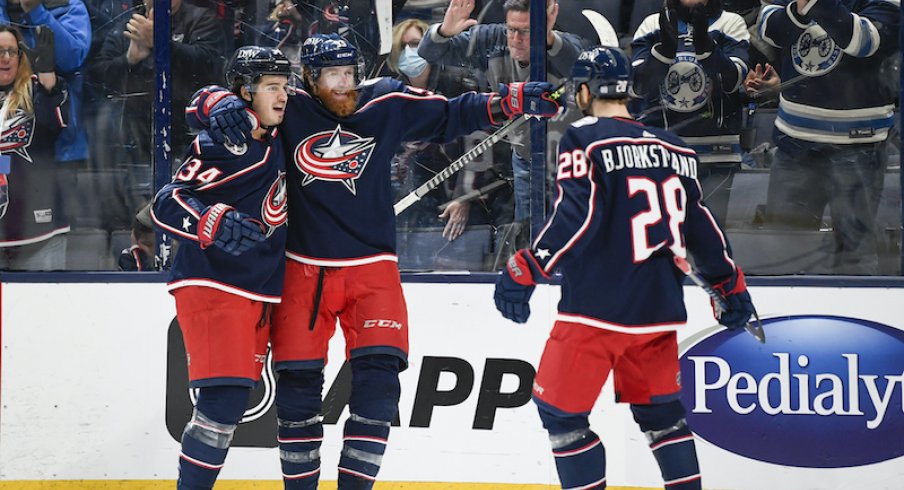 Columbus Blue Jackets' Jake Voracek celebrates his first period power play goal with Oliver Bjorkstrand and Cole Sillinger against the New York Rangers at Nationwide Arena.