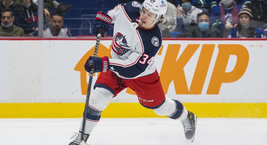 Cole Sillinger skates against the Vancouver Canucks