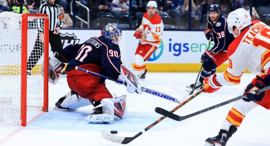 Elvis Merzlikins faced 62 shots in Columbus' first game this season against Calgary.