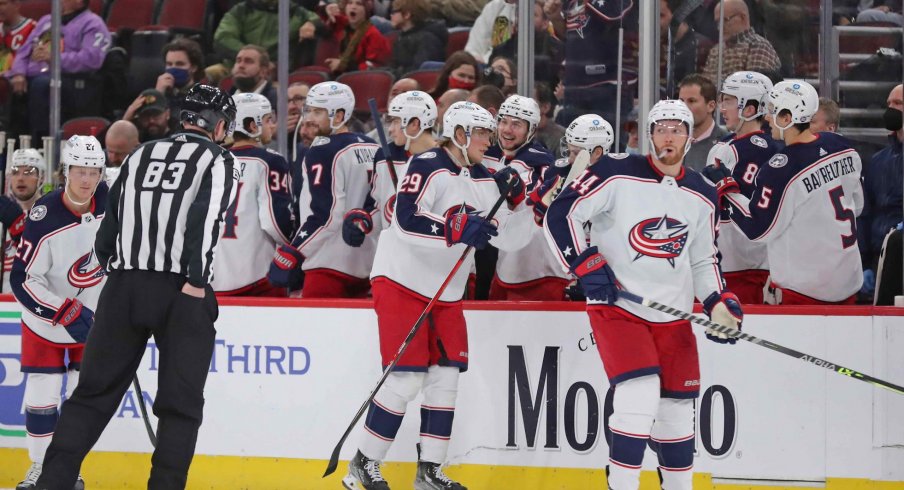 Feb 17, 2022; Chicago, Illinois, USA; Columbus Blue Jackets left wing Patrik Laine (29) is congratulated for scoring a goal during the second period against the Chicago Blackhawks at the United Center.