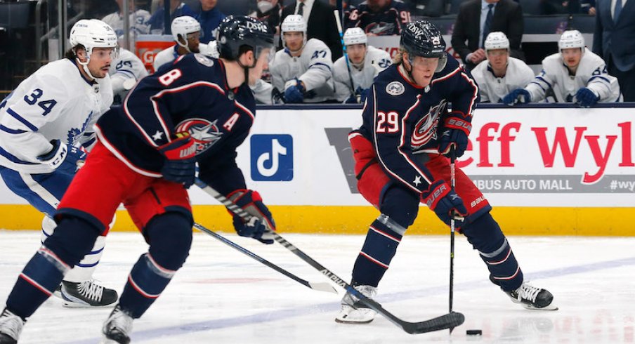 Columbus Blue Jackets Patrik Laine carries the puck up ice against the Toronto Maple Leafs in the first period.