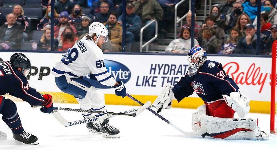  The Columbus Blue Jackets' J-F Berube makes a pad save against the Toronto Maple Leafs' William Nylander in the second period at Nationwide Arena